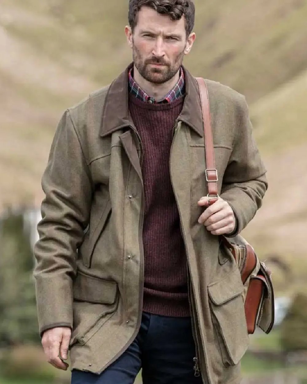 Autumn Bracken Coloured Hoggs of Fife Kinloch Technical Tweed Field Coat on blurry background 