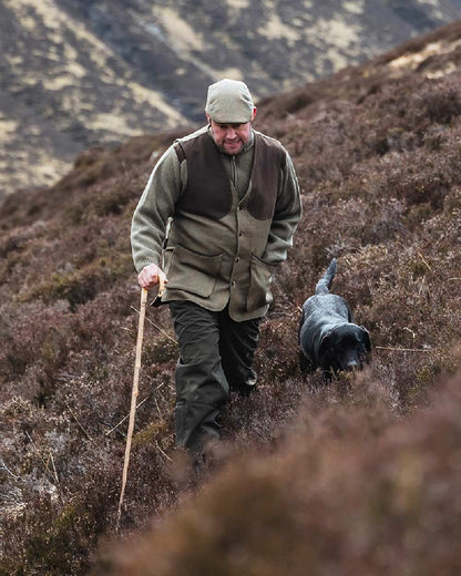 Autumn Bracken Coloured Hoggs of Fife Kinloch Technical Tweed Field Waistcoat on  mountain background 