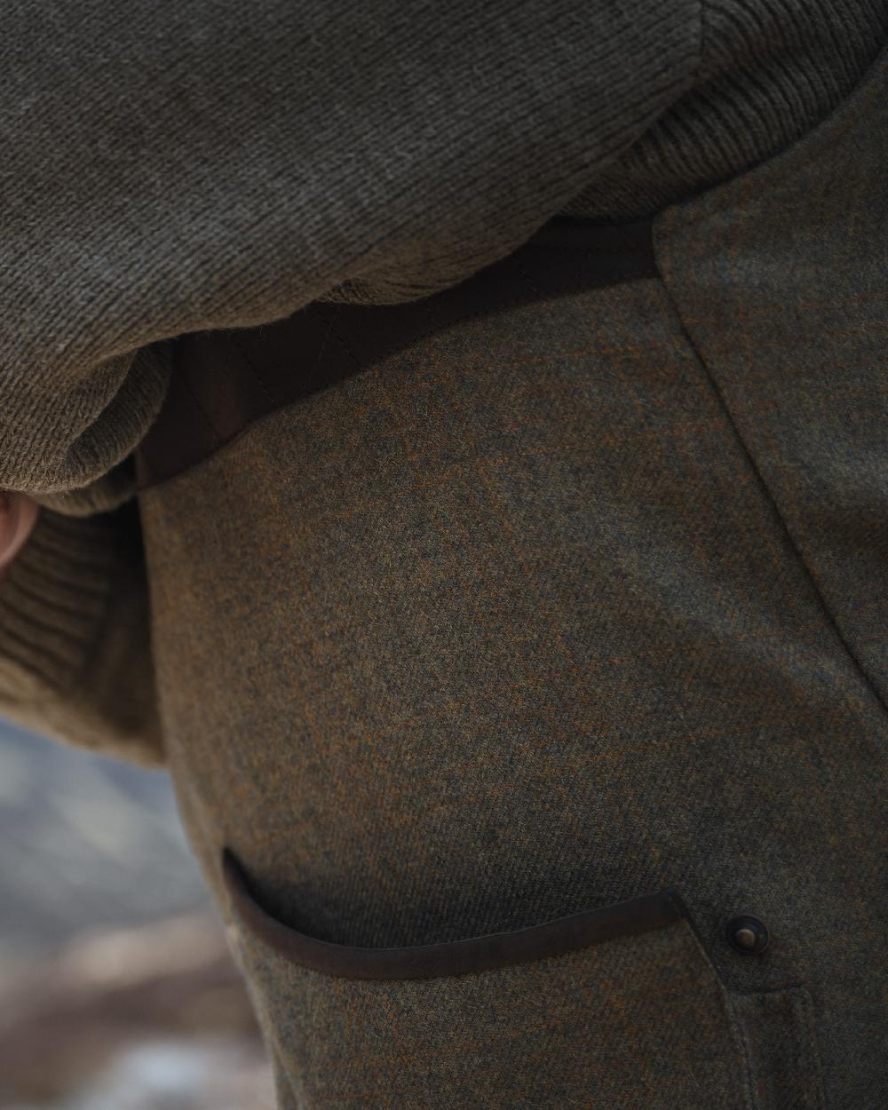 Autumn Bracken Coloured Hoggs of Fife Kinloch Technical Tweed Field Waistcoat on blurry background 