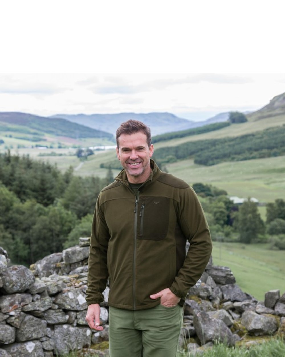 Green Brown Coloured Hoggs of Fife Kinross II Waterproof Field Jacket on mountain background 