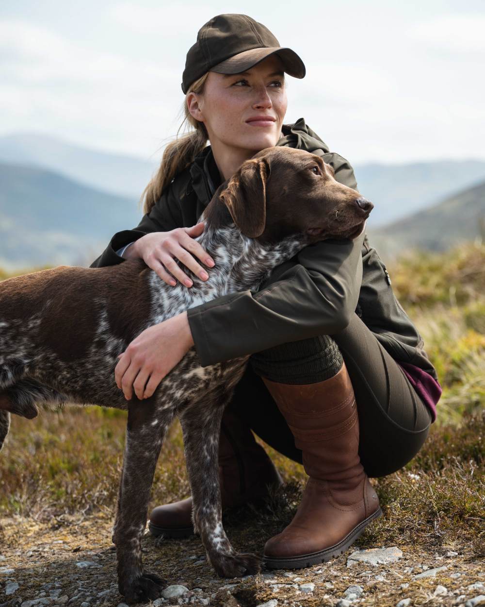 Oxblood Coloured Hoggs of Fife Letham Country Waterproof Boots on outdoor background 