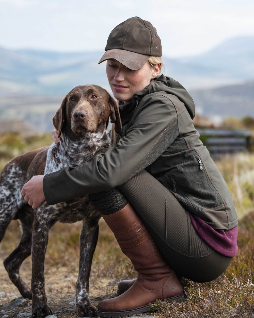 Oxblood Coloured Hoggs of Fife Letham Country Waterproof Boots on outdoor background 