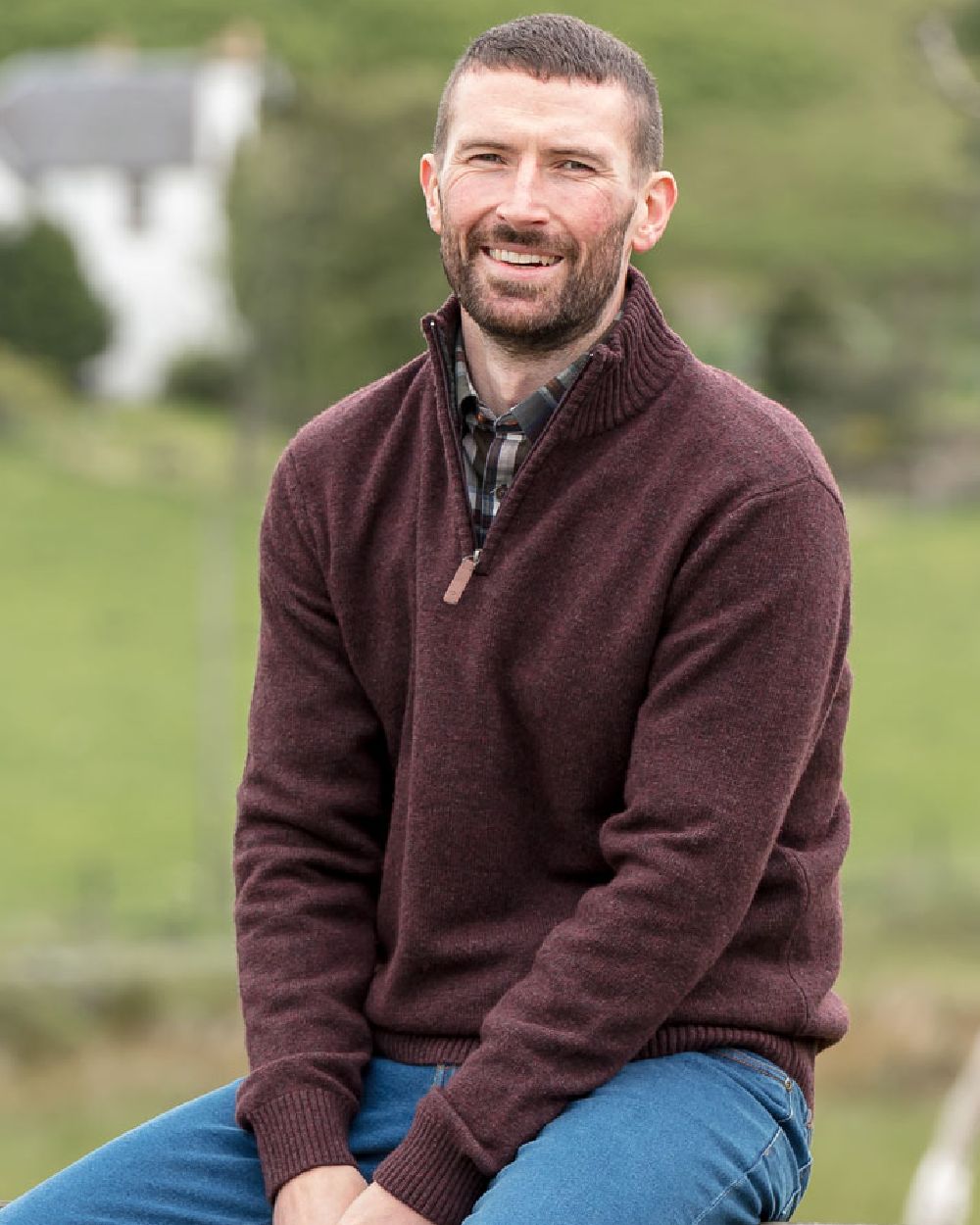 Redwood coloured Hoggs of Fife Lothian Zip Neck Pullover Clearance on blurry background 