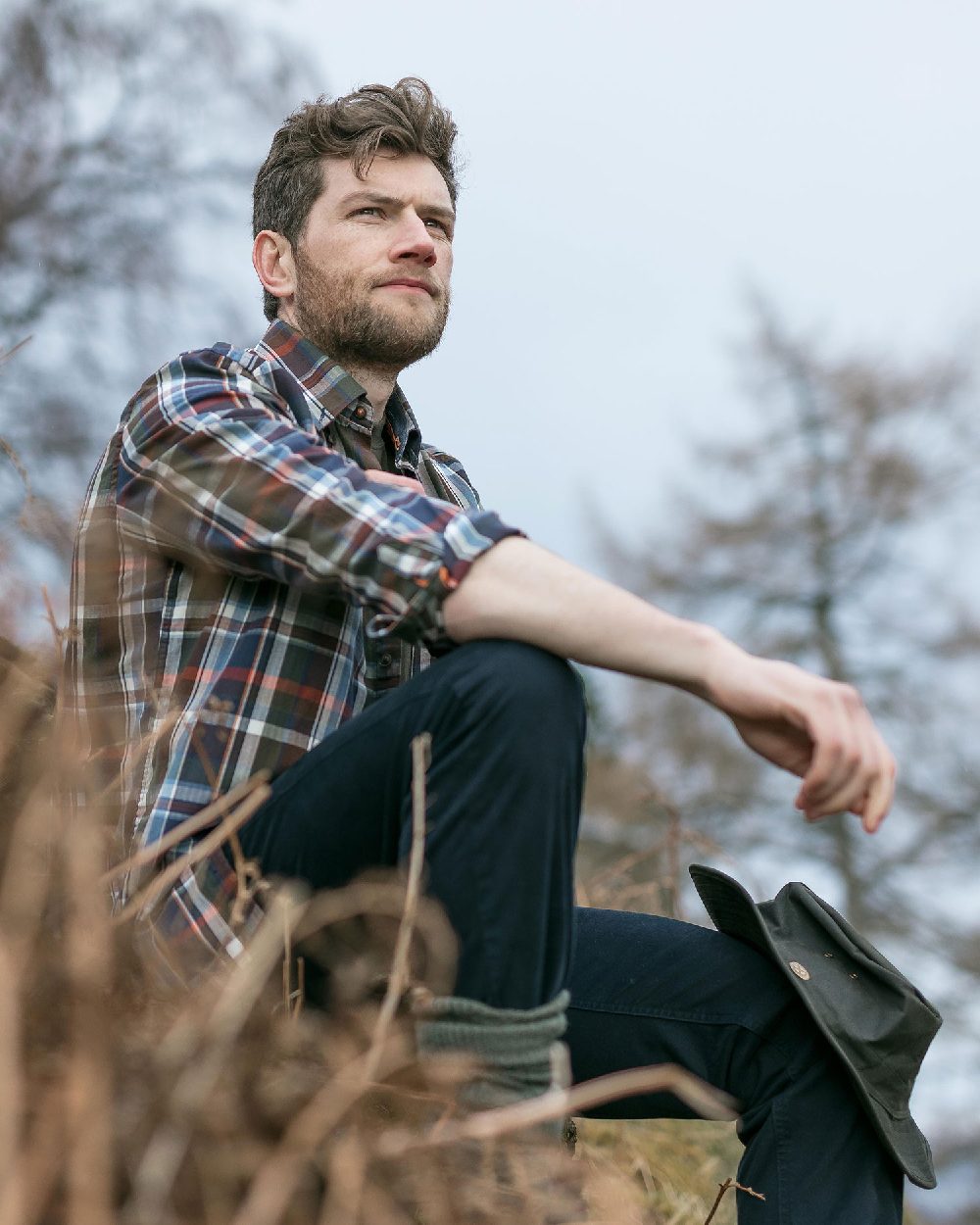 Navy Check Coloured Hoggs of Fife Luthrie Plaid Shirt on forest background 