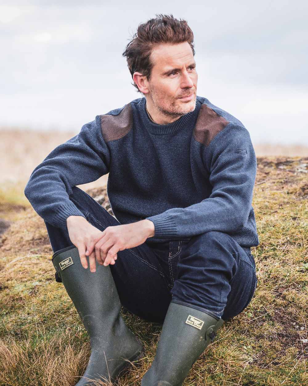 Marled Navy Coloured Hoggs of Fife Melrose Hunting Pullover on mountain background 