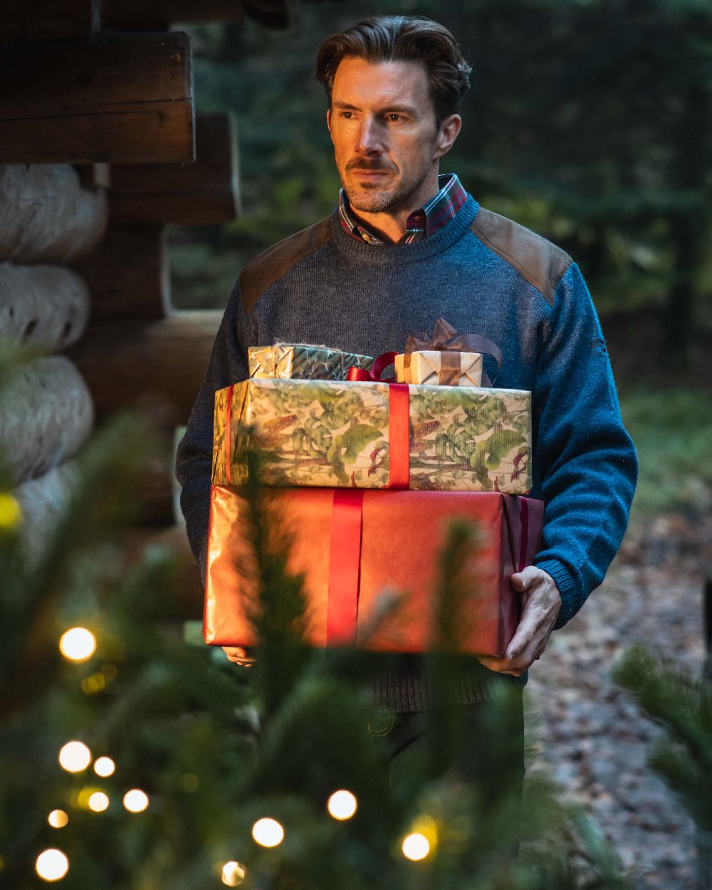 Storm Blue coloured Hoggs of Fife Melrose II Crew Pullover on outdoor background 