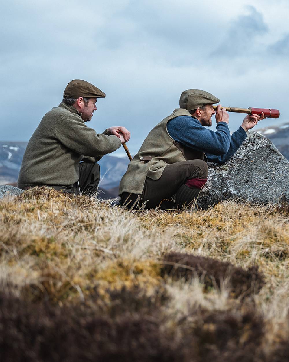 Storm Blue coloured Hoggs of Fife Melrose II Crew Pullover on mountain background 