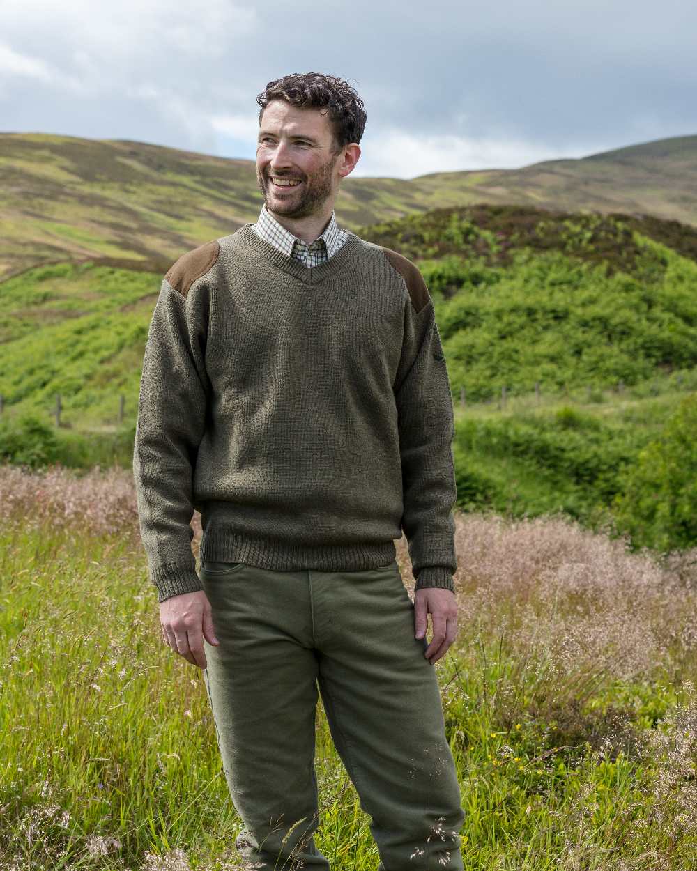 Loden Coloured Hoggs of Fife Melrose V-Neck Hunting Pullover on mountain background #colour_loden