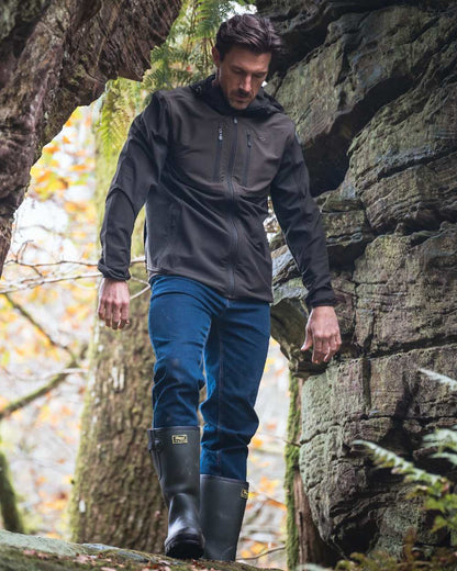Green Coloured Hoggs of Fife Mens Ardross 4 Way Active Jacket on forest background 