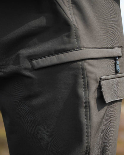 Green Coloured Hoggs of Fife Mens Ardross 4 Way Active Trousers on blurry background 