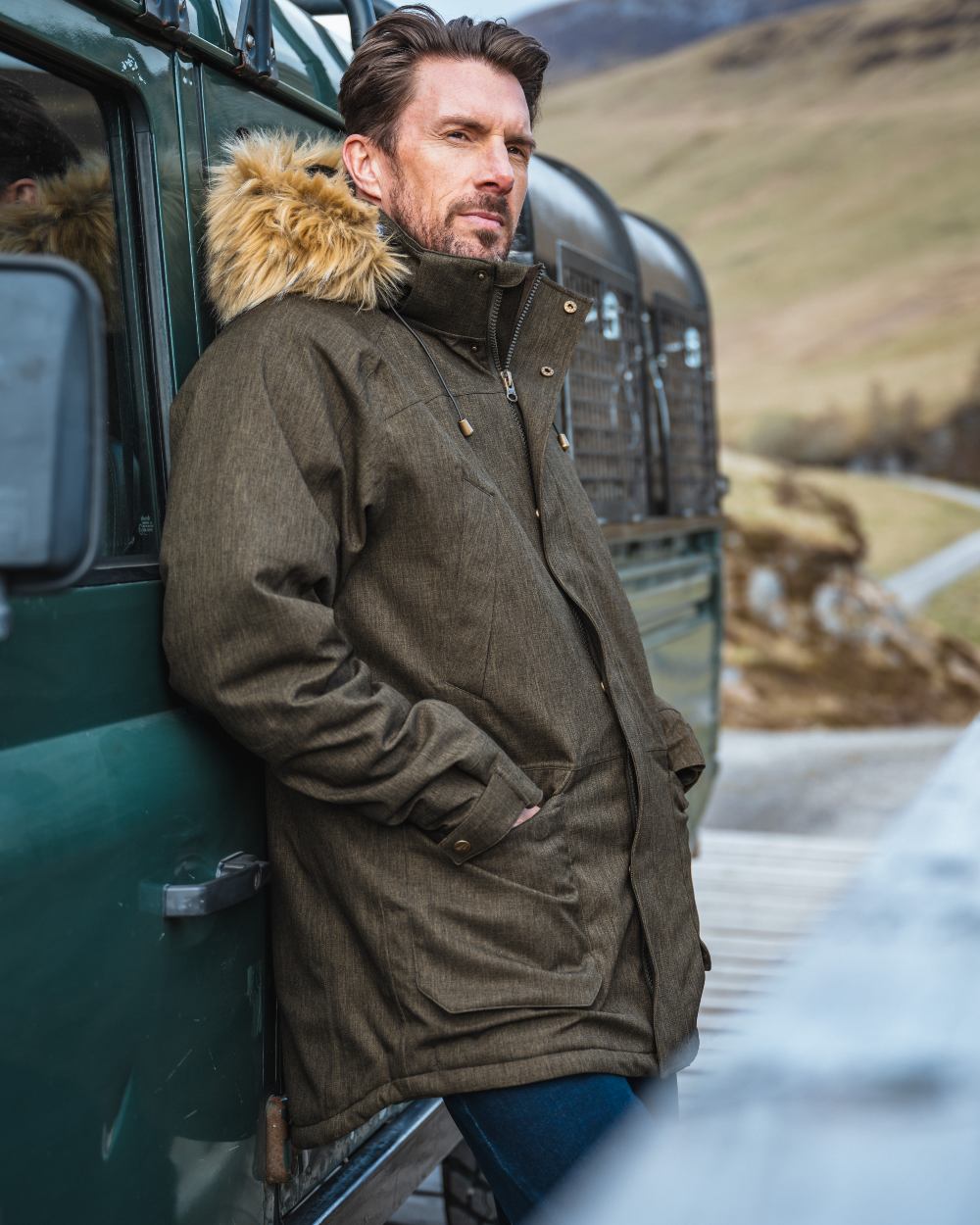 Forest Green coloured Hoggs of Fife Mens Argyll II Jacket on bus background 