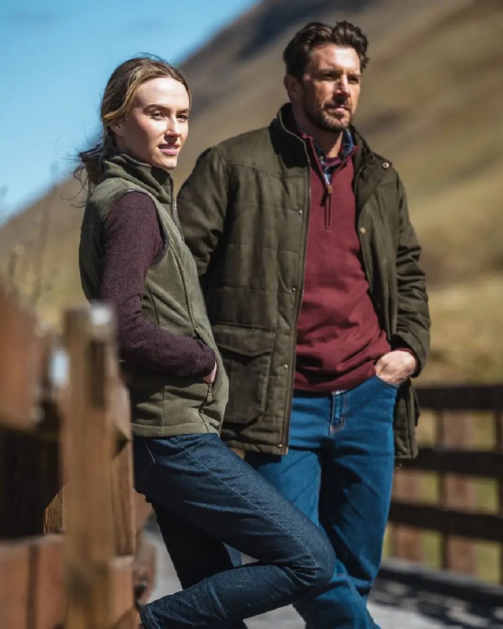 Loden coloured Hoggs of Fife Mens Glenesk Quilted Jacket on blurry background 