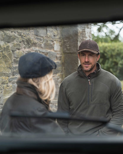 Beluga Coloured Hoggs of Fife Mens Islander Techpro Quarter Zip Shirt on outdoor background 