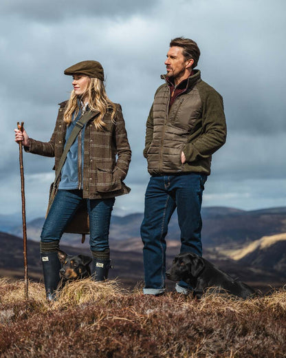 Juniper Marl Coloured Hoggs of Fife Mens Melville Hybrid Jacket on mountain background 