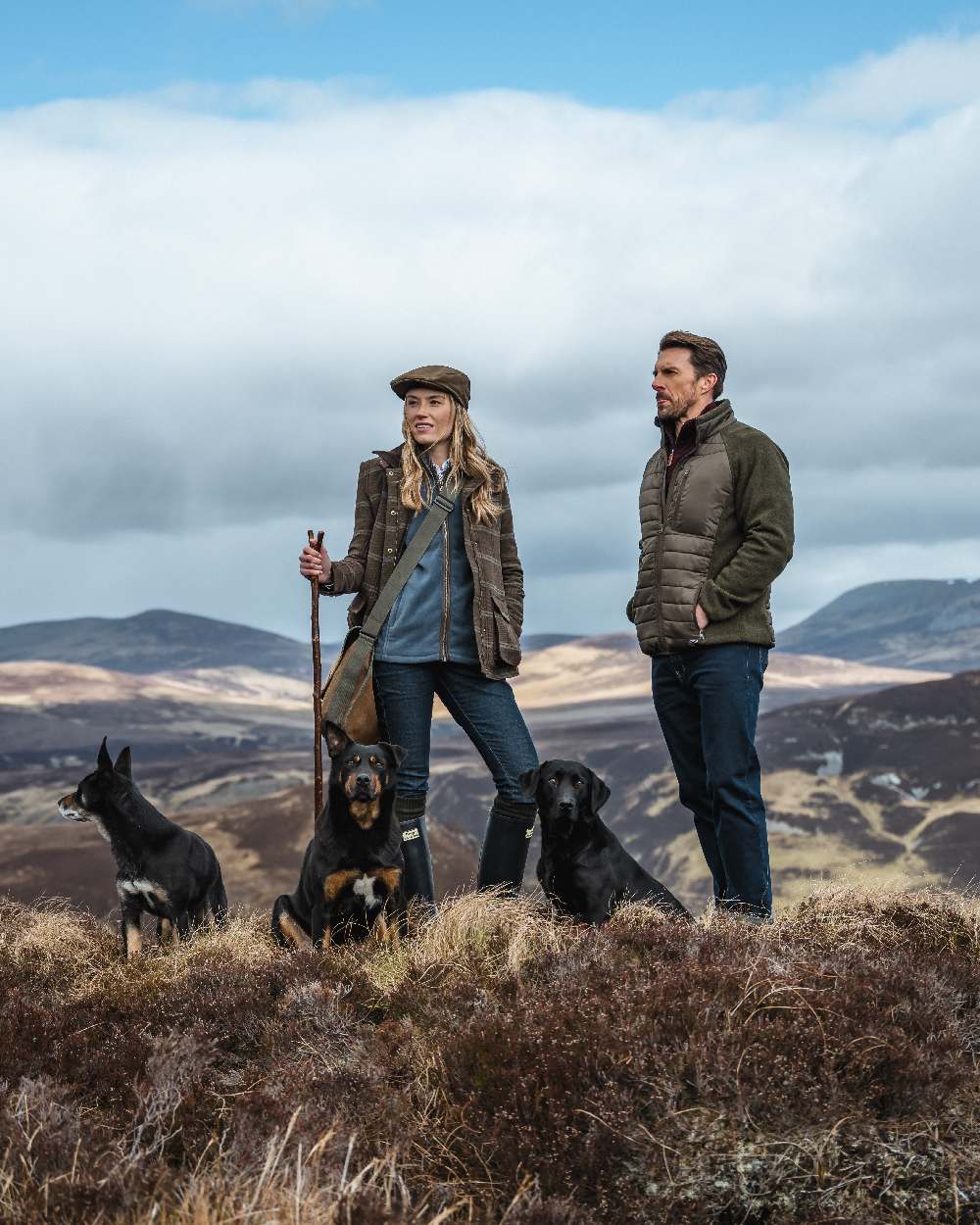 Juniper Marl Coloured Hoggs of Fife Mens Melville Hybrid Jacket on mountain background 