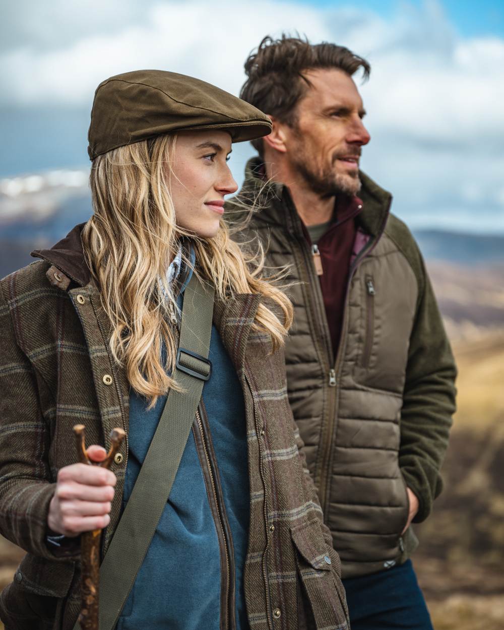 Juniper Marl Coloured Hoggs of Fife Mens Melville Hybrid Jacket on blurry background 