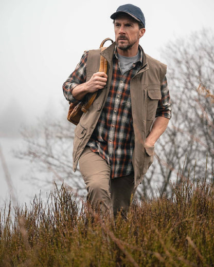 Khaki coloured Hoggs of Fife Mens Rothesay Utility Trousers on lake background 