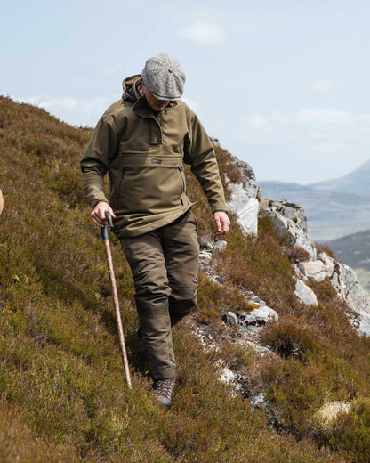 Olive Coloured Hoggs of Fife Mens Torness Trilaminate Waterproof Smock on sky background 