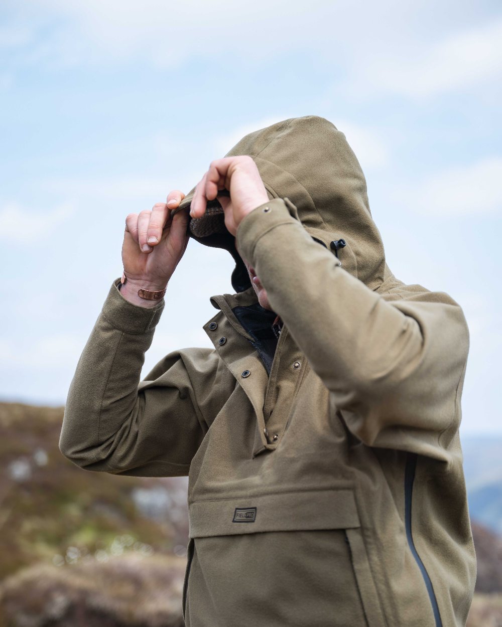 Olive Coloured Hoggs of Fife Mens Torness Trilaminate Waterproof Smock on sky background 