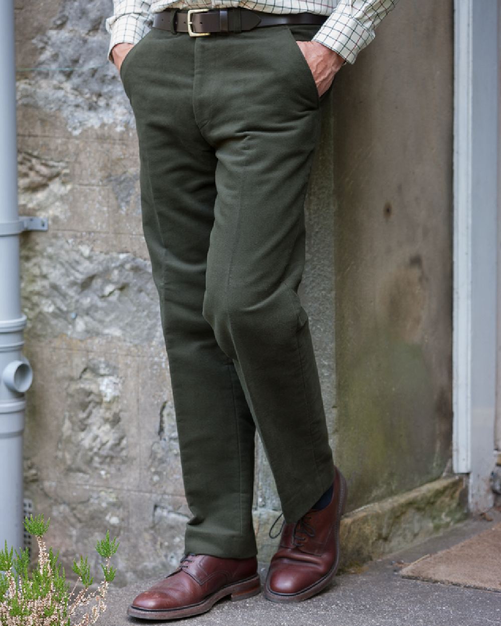 Dark Olive Coloured Hoggs of Fife Monarch II Moleskin Jeans on wall background 