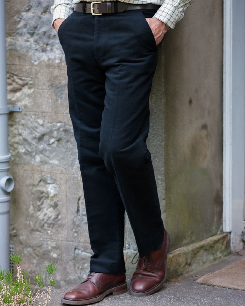 Navy Coloured Hoggs of Fife Monarch II Moleskin Jeans on wall background 