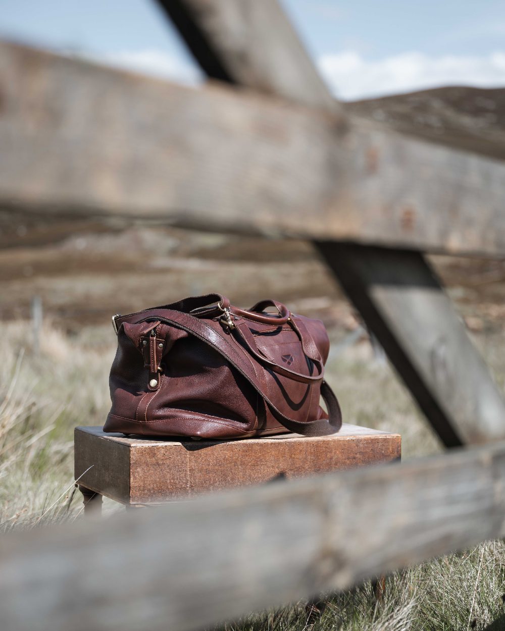 Conker Coloured Hoggs of Fife Monarch Leather Carryon Holdall on outdoor background 