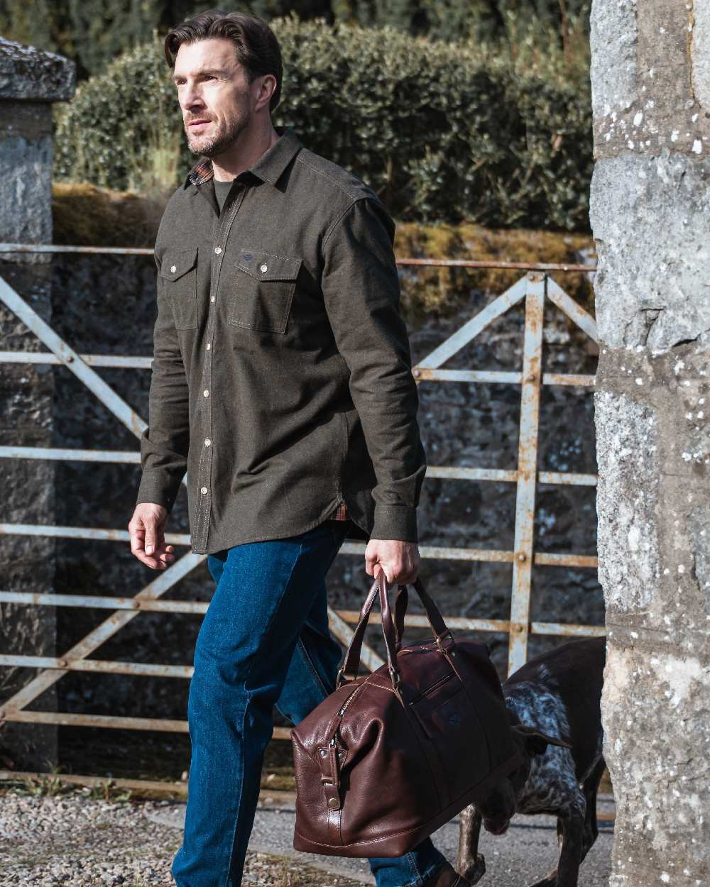 Conker Coloured Hoggs of Fife Monarch Leather Carryon Holdall on outdoor background 