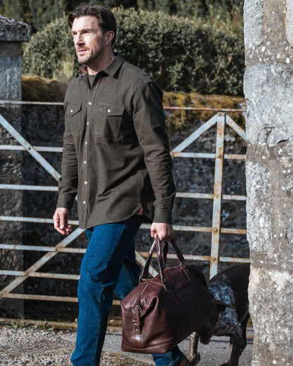 Conker Coloured Hoggs of Fife Monarch Leather Carryon Holdall on outdoor background 