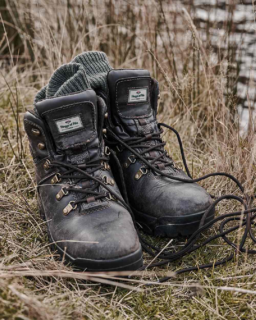 Brown Coloured Hoggs of Fife Munro Classic Leather Hiking Boots on coastal background 