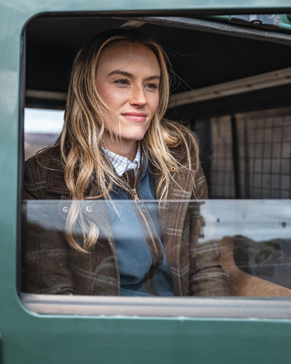 Bracken Tweed Coloured Hoggs of Fife Musselburgh Tweed Field Coat on car background 