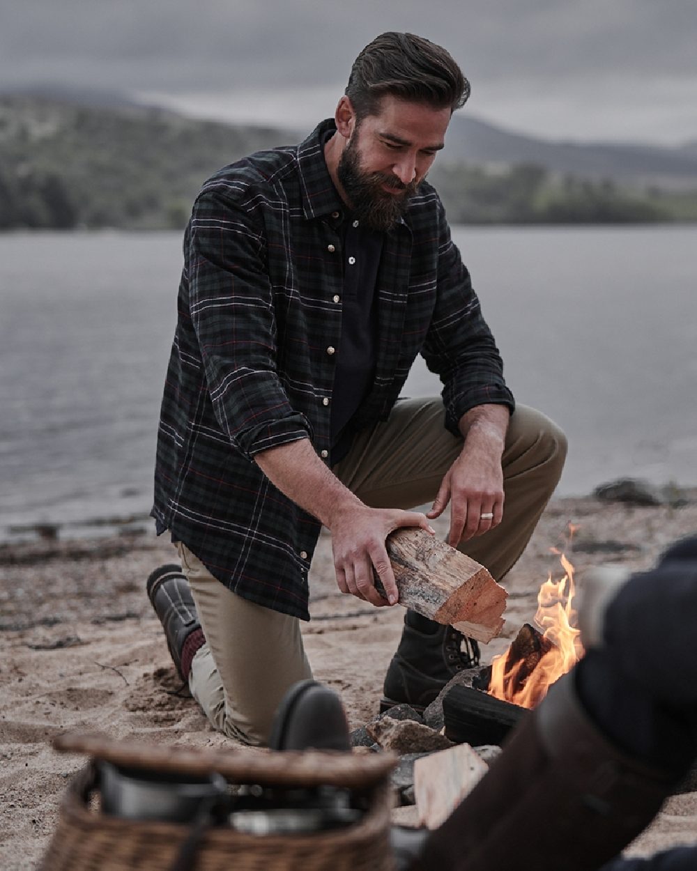 Dark Green Tartan Check Coloured Hoggs of Fife Pitscottie Flannel Shirt on sea background 