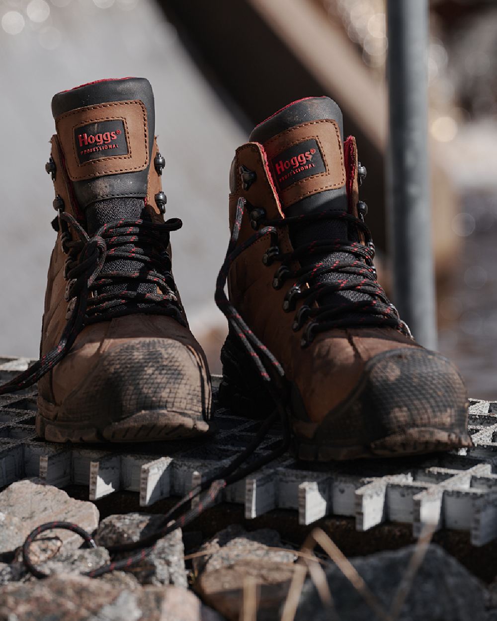 Tan Nubuck Coloured Hoggs of Fife Poseidon S3 Safety Lace-Up Boots on blurry background 