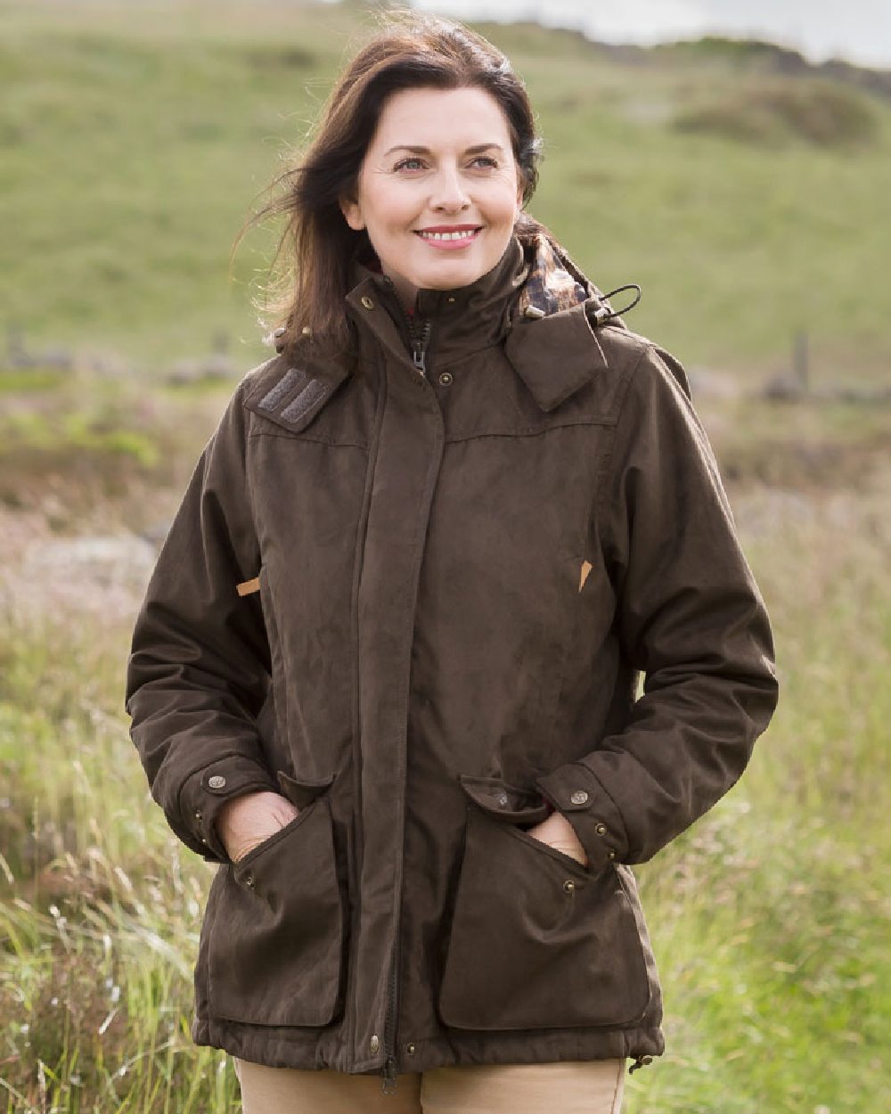 Field Green Coloured Hoggs of Fife Rannoch Ladies Hunting Jacket on land background 