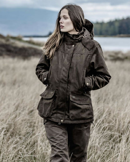 Field Green Coloured Hoggs of Fife Rannoch Ladies Shooting Trousers on countryside background 