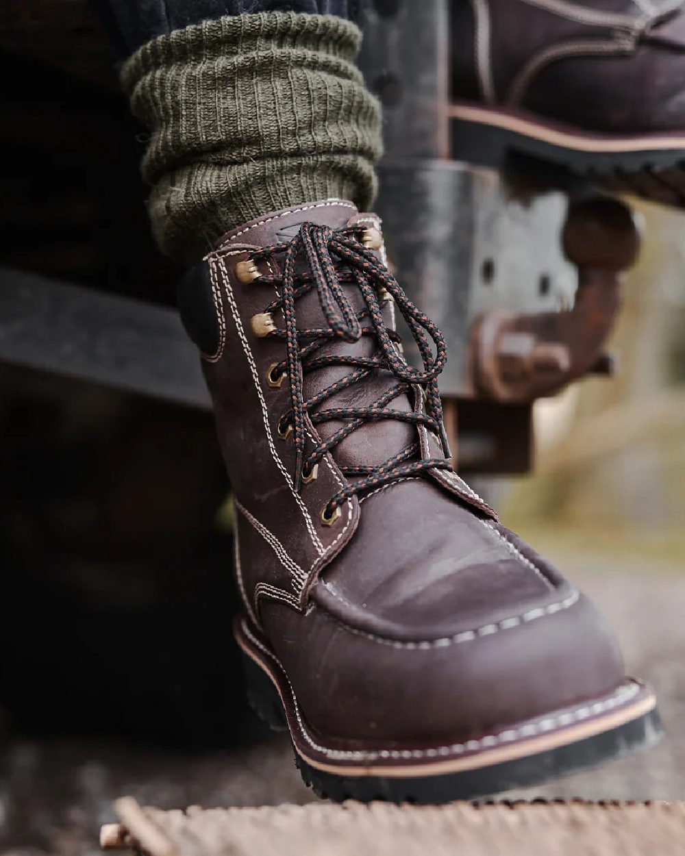 Oak Brown Coloured Hoggs of Fife Selkirk Moc Work Boots on car background 