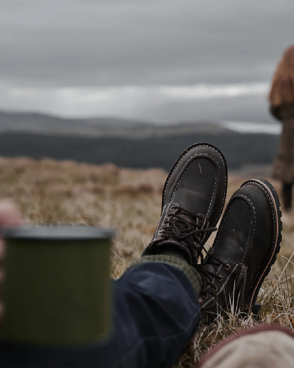 Oak Brown Coloured Hoggs of Fife Selkirk Moc Work Boots on countryside background 