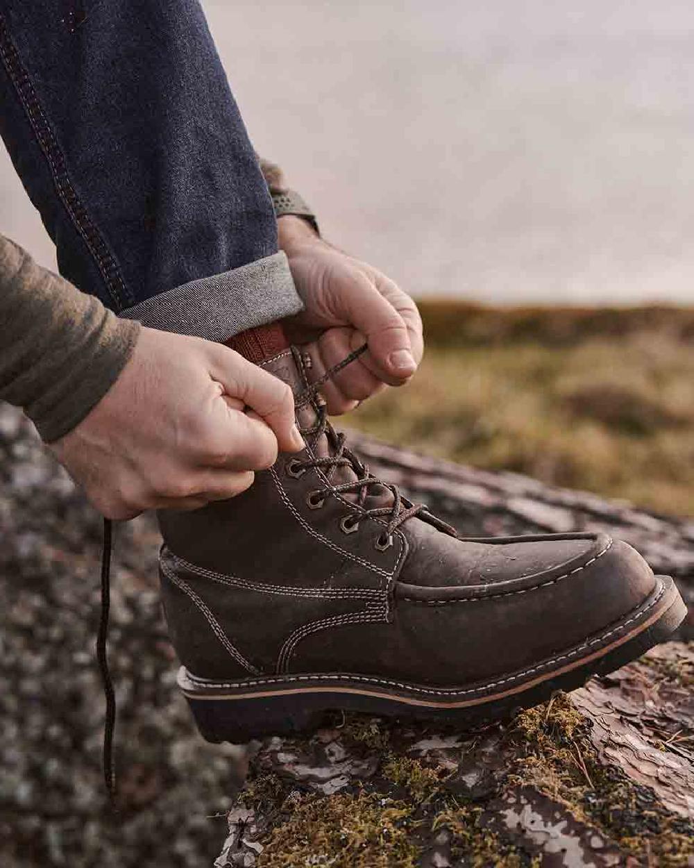 Oak Brown Coloured Hoggs of Fife Selkirk Moc Work Boots on countryside background 