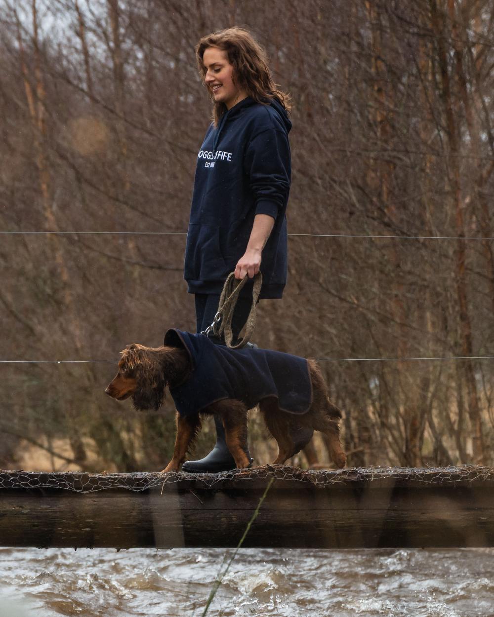 Navy Coloured Hoggs of Fife Stenton Fleece Dog Coat on countryside background 