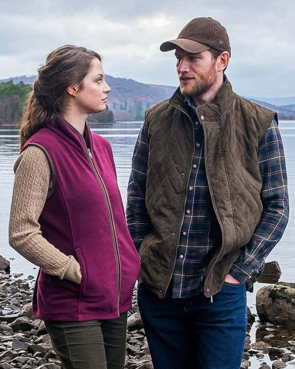 Merlot Coloured Hoggs of Fife Stenton Ladies Fleece Gilet on lake background 