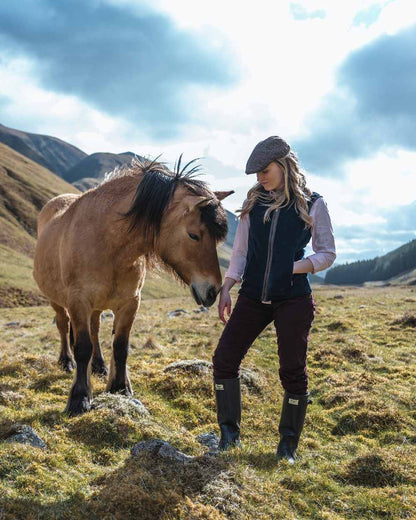 Midnight Navy Coloured Hoggs of Fife Stenton Ladies Fleece Gilet on mountain background 