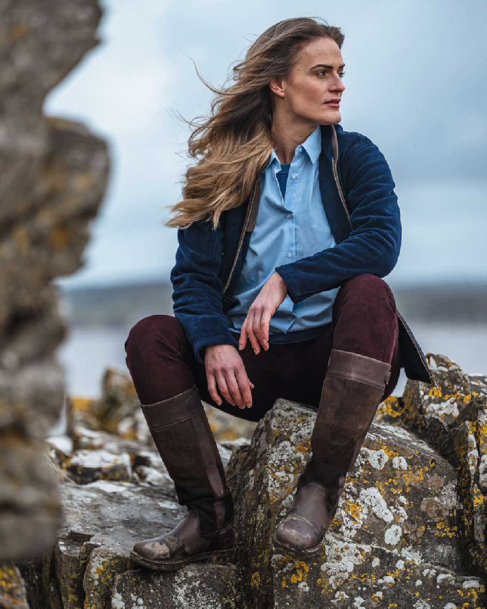 Navy Coloured Hoggs of Fife Stenton Ladies Fleece Jacket on blurry background 