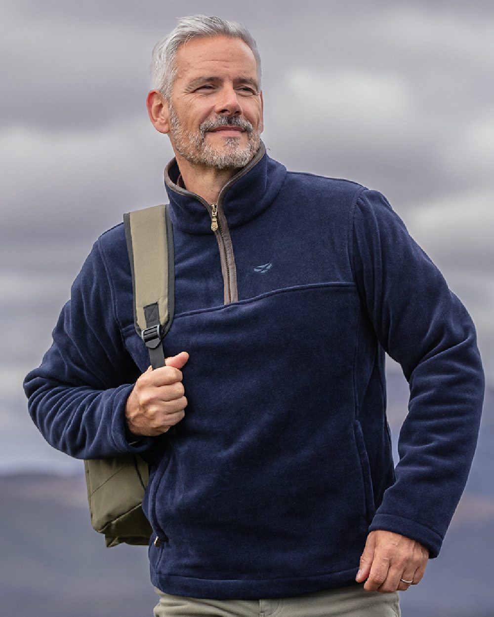 Midnight Navy Coloured Hoggs of Fife Stenton Quarter Zip Fleece on blurry background 