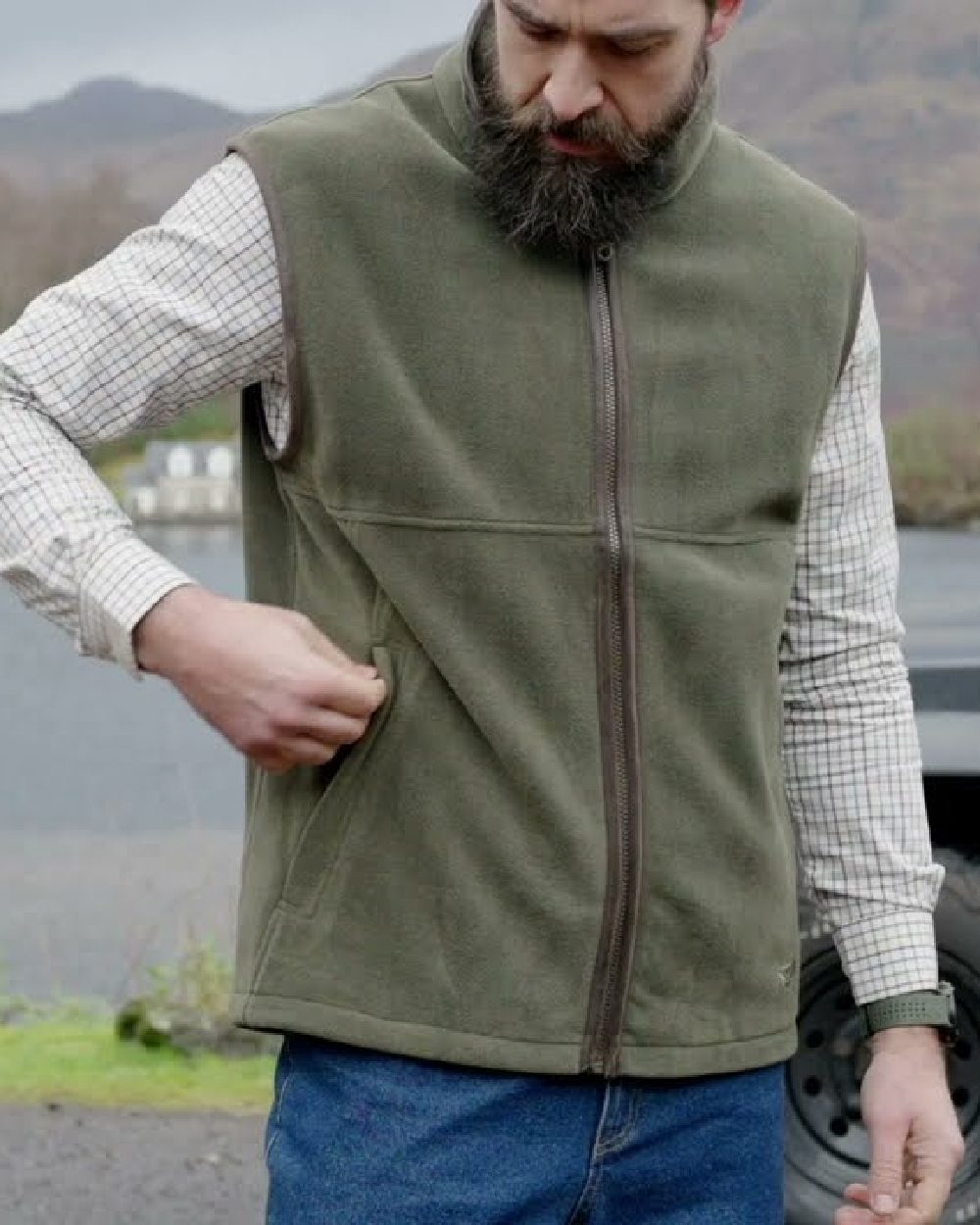 Lovat coloured Hoggs of Fife Stenton Technical Fleece Gilet on mountain background 