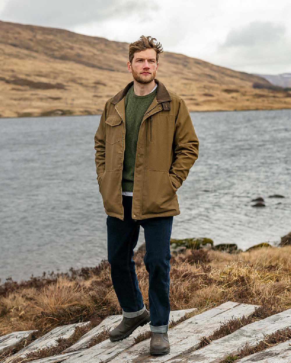 Camel Coloured Hoggs of Fife Stewarton Canvas Coat on river background 