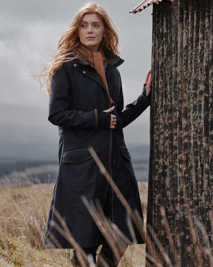 Navy Coloured Hoggs of Fife Struther Ladies Long Riding Coat on sky background 