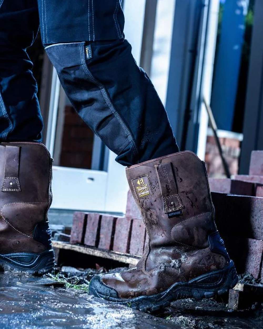 Brown Coloured Hoggs of Fife Thor Safety Rigger Boots on water background 