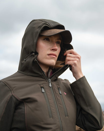 Green Coloured Hoggs of Fife Womens Ardross 4-Way Active Jacket on mountain background 