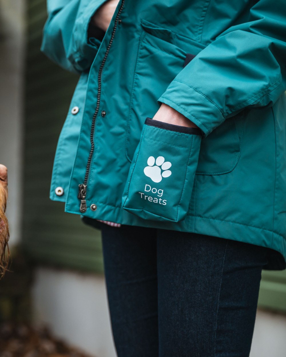 Teal Coloured Hoggs of Fife Womens Fara Waterproof Jacket on blurry background 