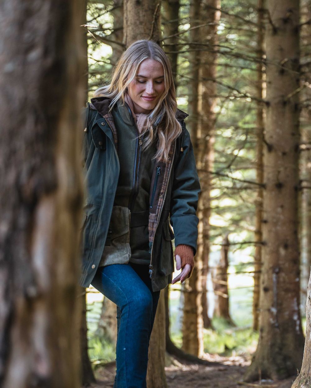 Forest Green Coloured Hoggs of Fife Womens Kelso Waterproof Waxed Jacket on outdoor background 
