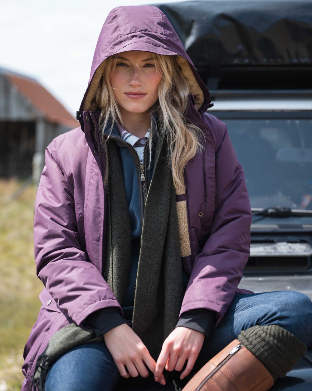 Black Berry Coloured Hoggs of Fife Womens Walker Long Coat on outdoor background 